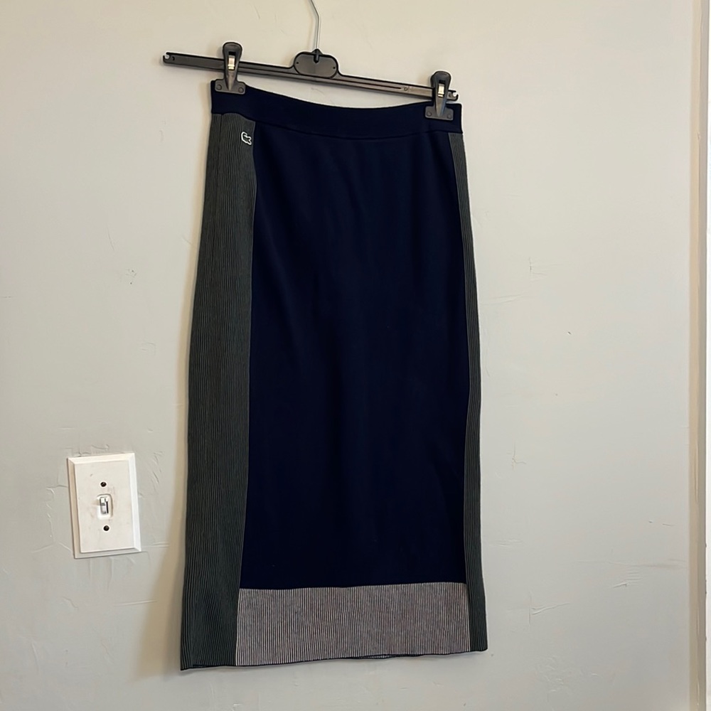 Lacoste size 36/6 cotton and polymide stretch long skirt.